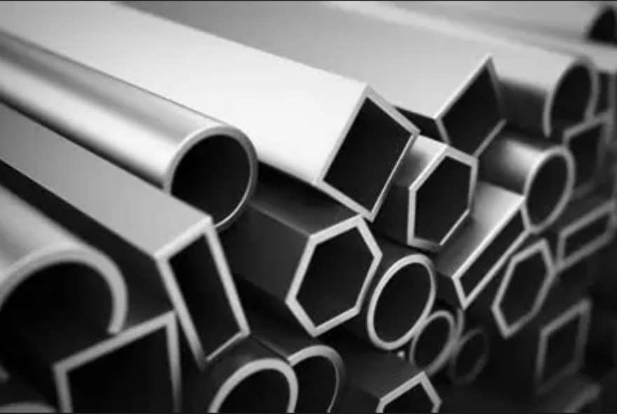 Stacked aluminium extrusion profiles in raw mill finish, the billet stock anodisers buy before processing
